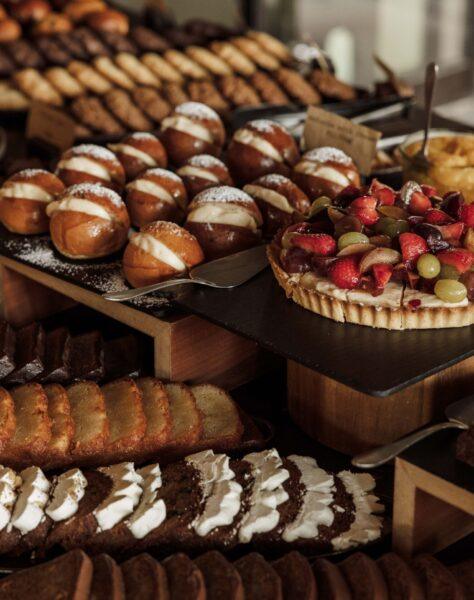 Breakfast offering at Casa Cook Samos with pastries and cakes
