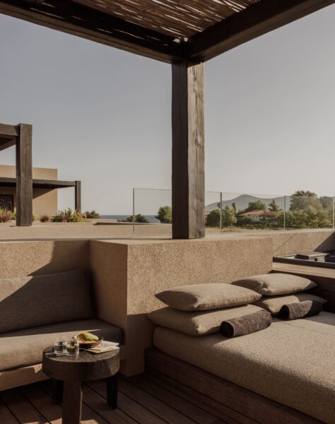 Jacuzzi suite view of the seating area on the outdoor balcony